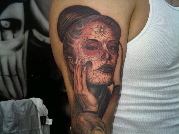 Mexican traditional colored very detailed shoulder tattoo of woman portrait
