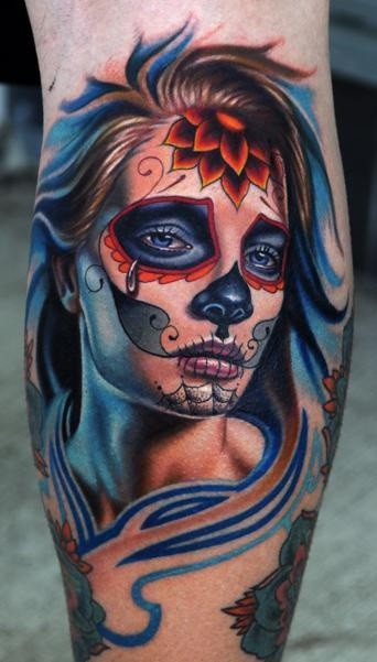 Mexican traditional style beautiful looking leg tattoo of woman portrait