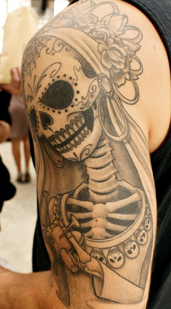 Mexican traditional style black and white skeleton bride tattoo on shoulder