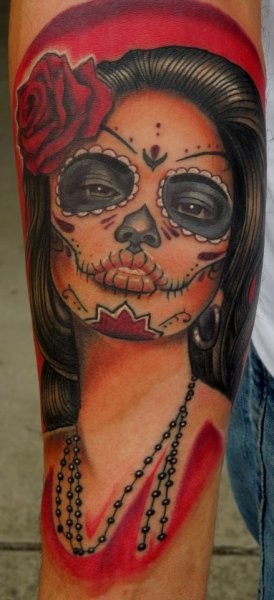 Mexican traditional style colored arm tattoo of beautiful woman face with flower