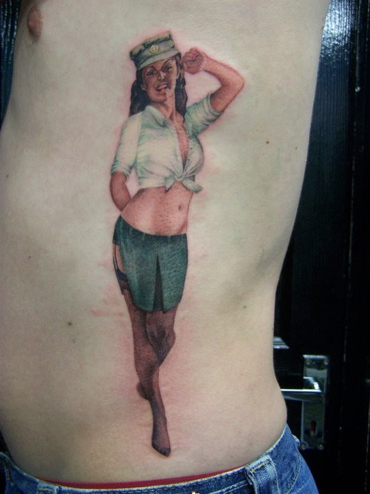 Military pin up girl tattoo on ribs by David Corden
