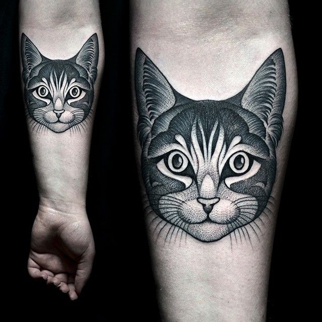 Modern dot style forearm tattoo of smiling cat