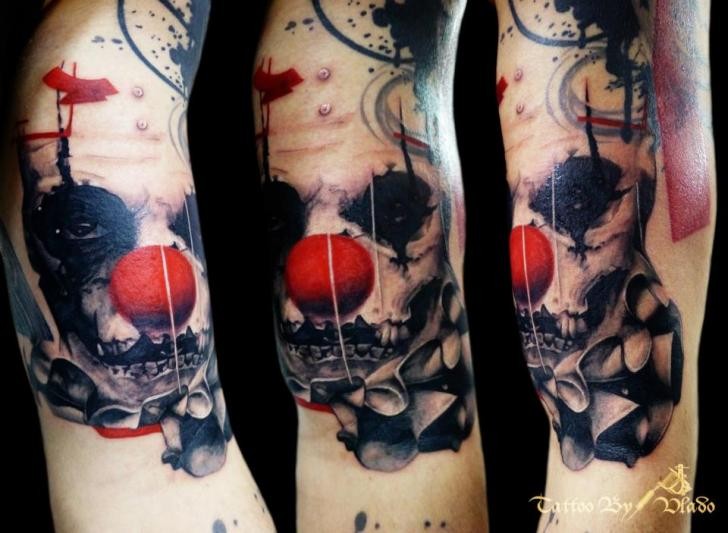 Modern style colored arm tattoo of clown maniac face