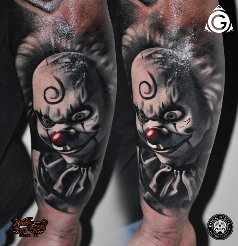 Modern style colored arm tattoo of maniac clown