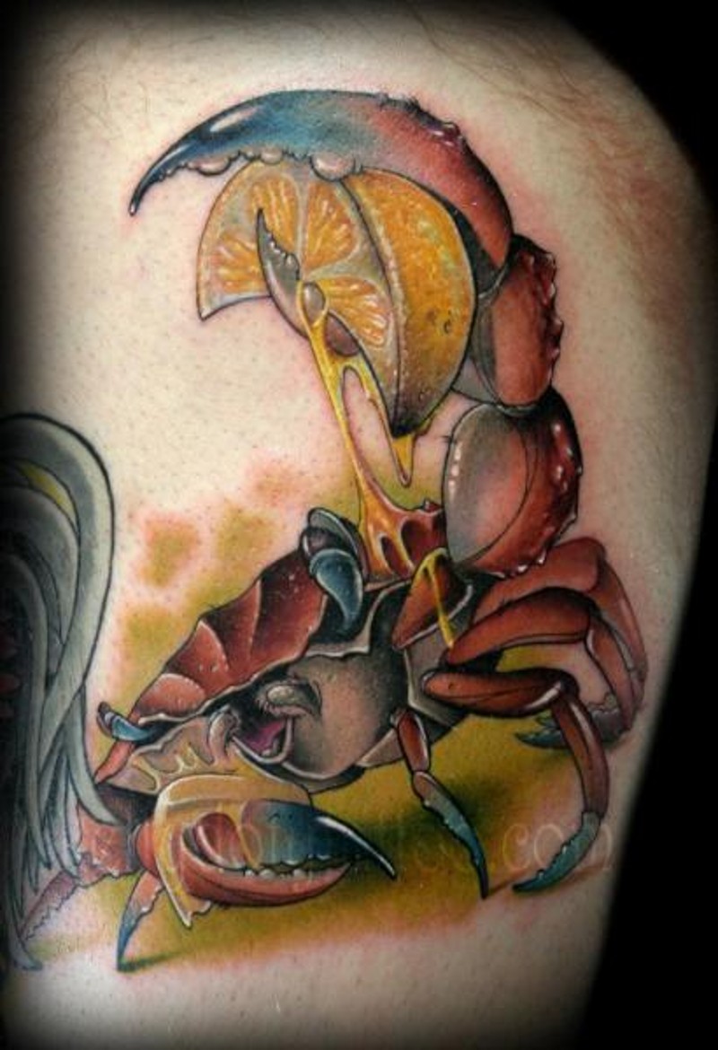 Modern style colored detailed crab tattoo with lemon slice