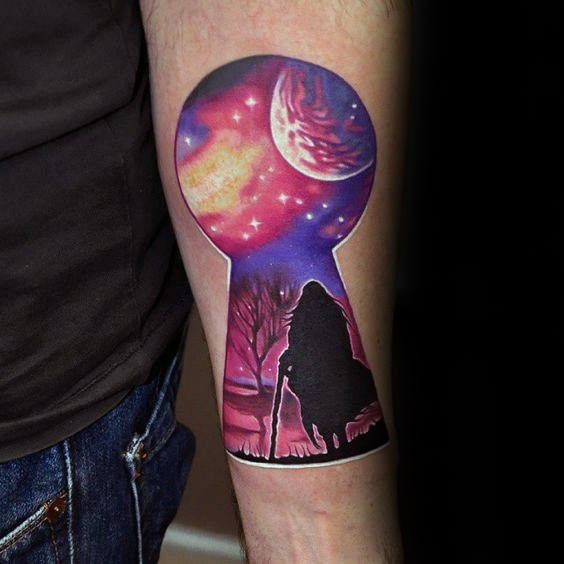Modern style colored forearm tattoo of key whole stylized with walking human under night sky
