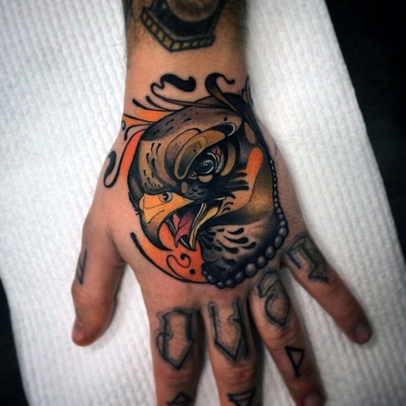 Modern style colored hand tattoo of eagle face