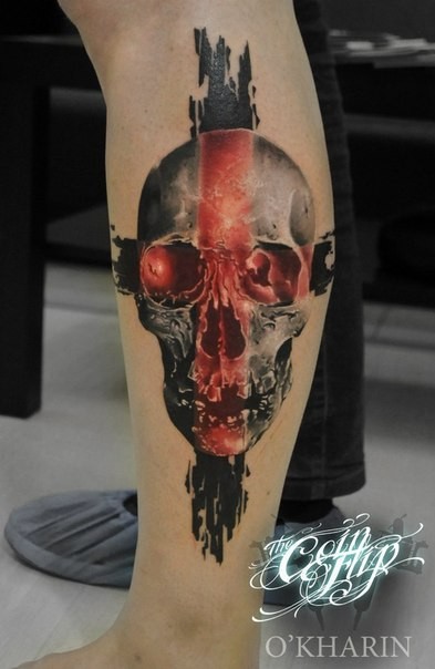 Modern style colored leg tattoo of human skull with cross