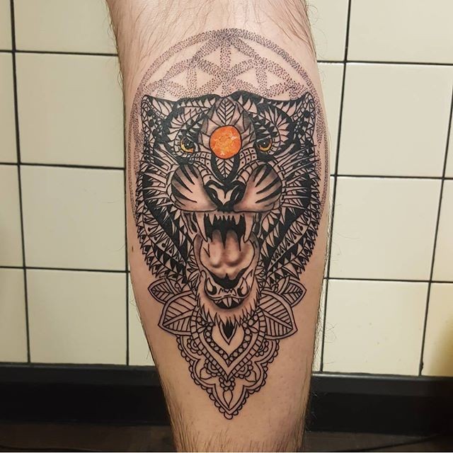 Modern style colored leg tattoo of roaring tiger with jewelry stone