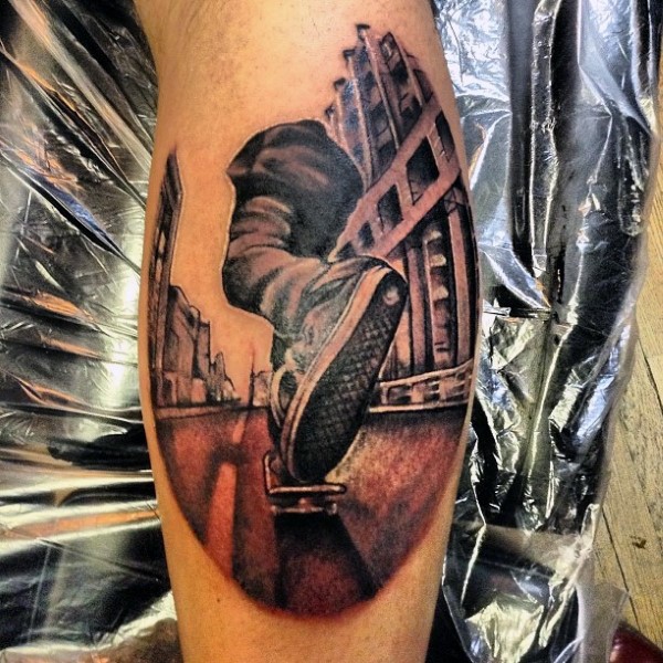 Modern style colored leg tattoo of skater