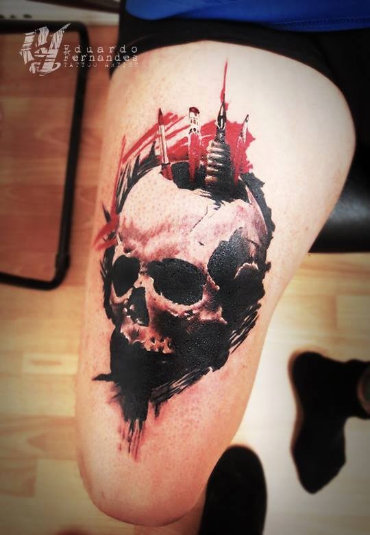 Modern style colored skull tattoo on thigh