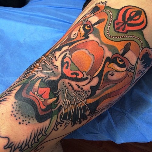 Modern style colored tattoo of big tiger with mysterious symbol