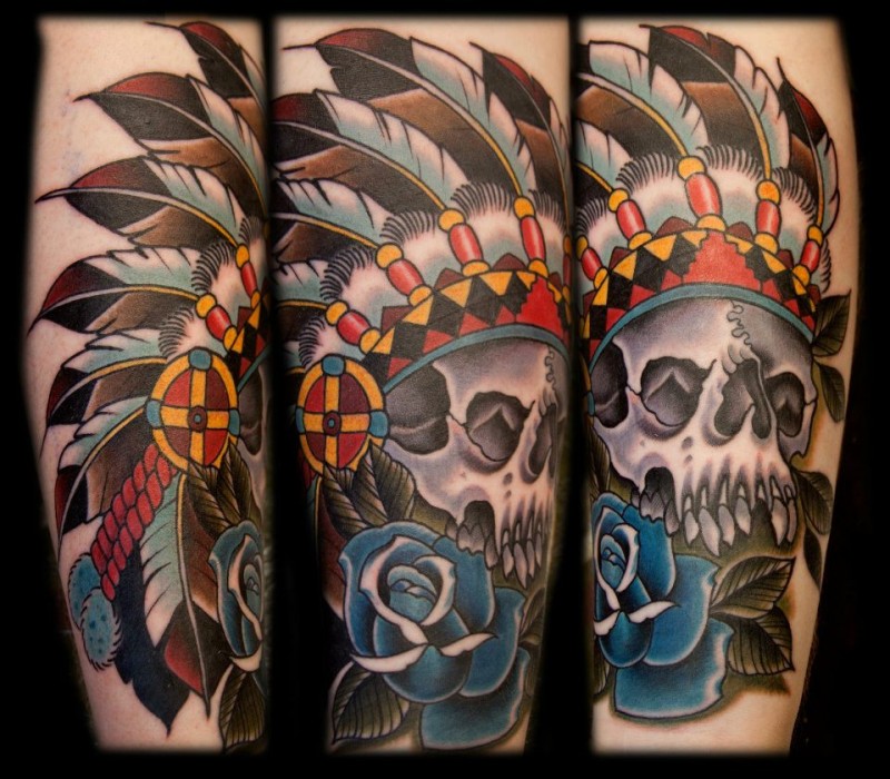 Modern style colored tattoo of Indian skull with blue rose
