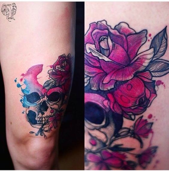 Modern style colored thigh tattoo of human skull with flower by Joanna Swirska