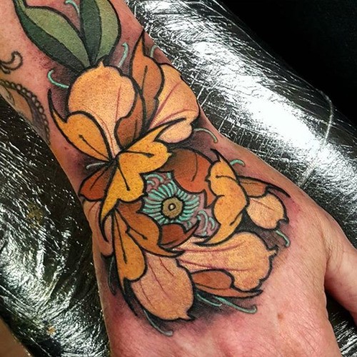 Modern style colored wrist tattoo of cool flower with eye