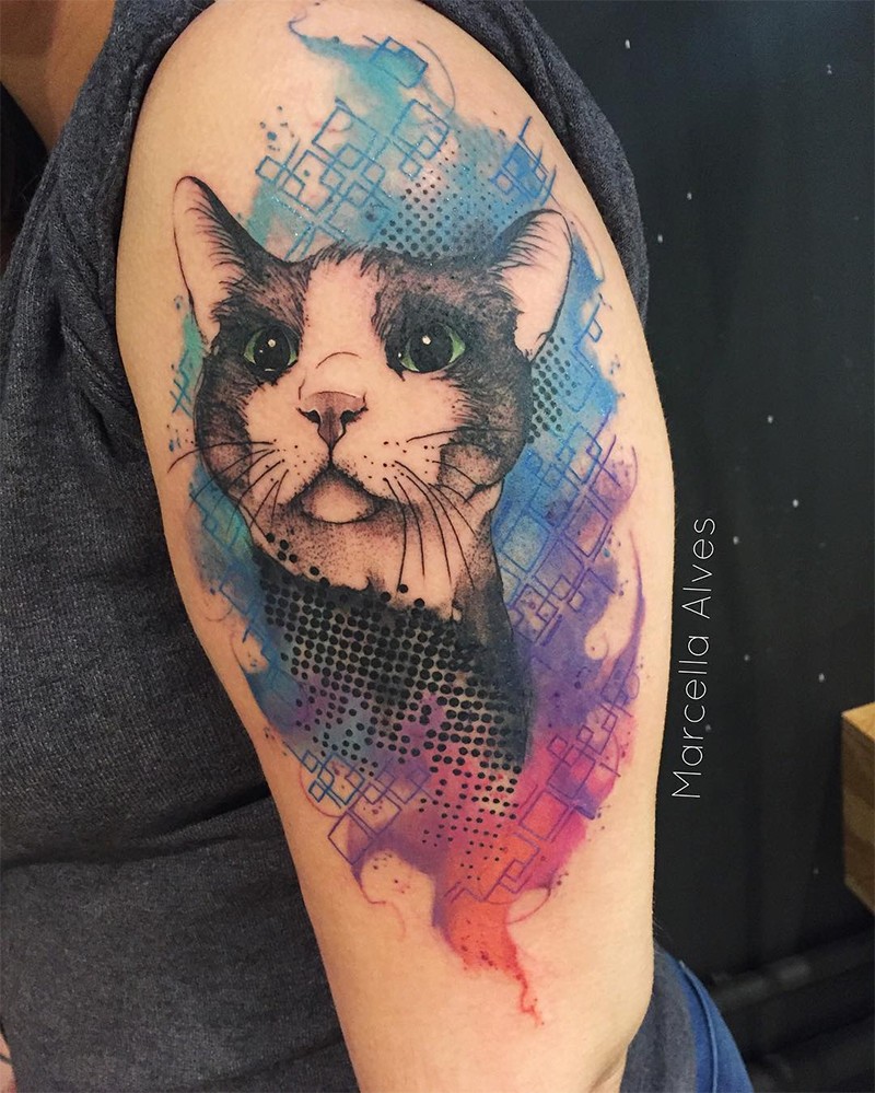 Modern style colorful upper arm tattoo of creative cat