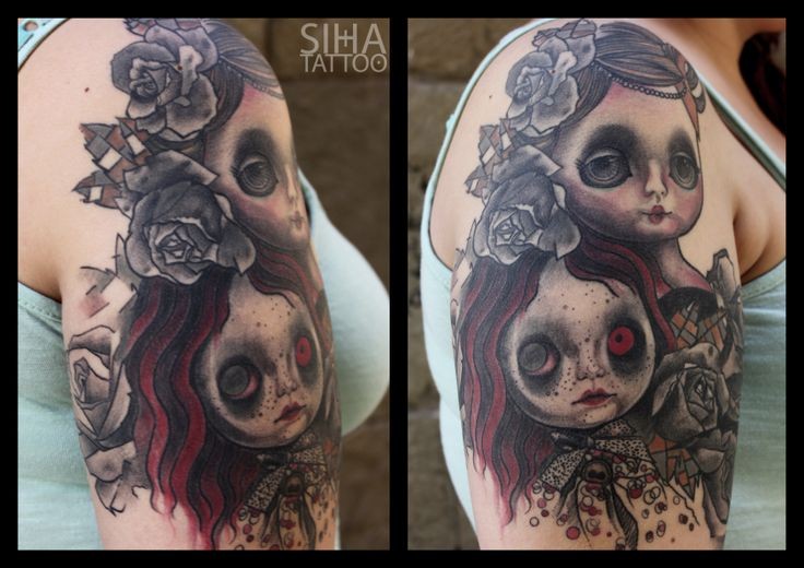 Modern style multicolored creepy dolls tattoo on shoulder with flowers