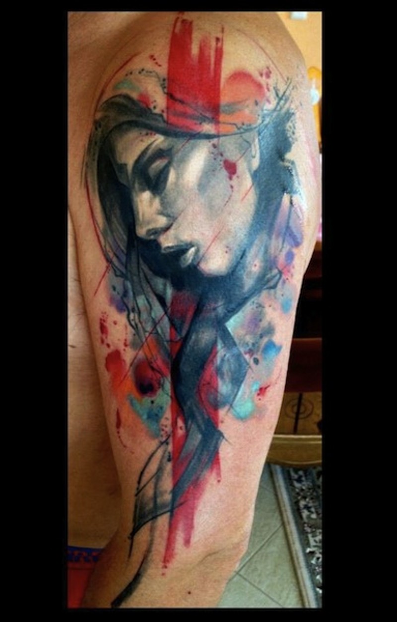 Modern style multicolored shoulder tattoo of mystic woman portrait and red line