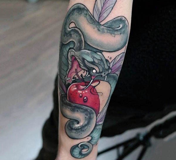 Modern style painted and colored snake tattoo on forearm combined with red apple