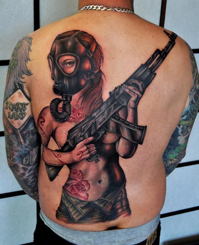 Modern traditional colored sexy woman with AK gun tattoo on back