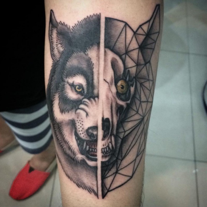 Modern traditional style colored arm tattoo of half wolf half skull
