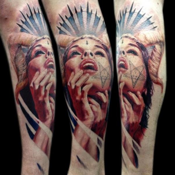 Modern traditional style colored arm tattoo of demonic woman with star