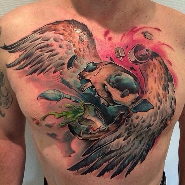 Modern traditional style colored chest tattoo of cat skull with wings and paint