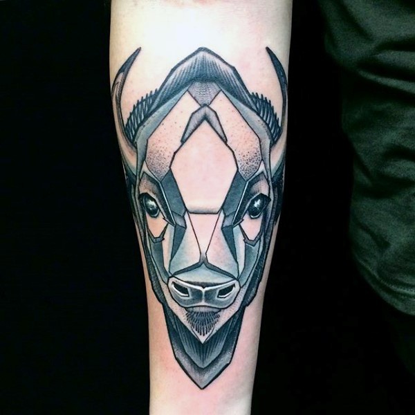 Modern traditional style colored forearm tattoo of typical bull