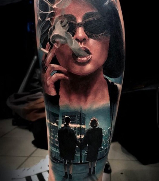 Modern traditional style colored leg tattoo of smoking woman with women couple