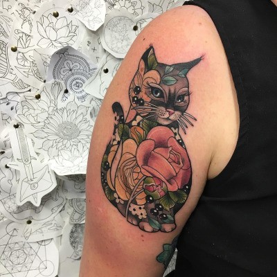 Modern traditional style colored shoulder tattoo of funny cat with flowers