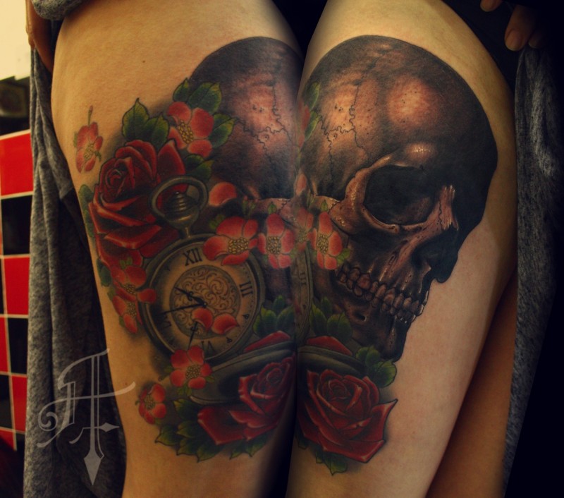 Modern traditional style colored thigh tattoo of human skull with clock and roses