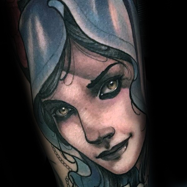 Modern traditional style colored woman portrait tattoo