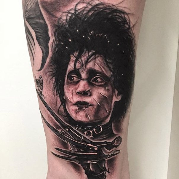 Movie hero Edward Scissorhands black and white tattoo on calf in portrait realistic style