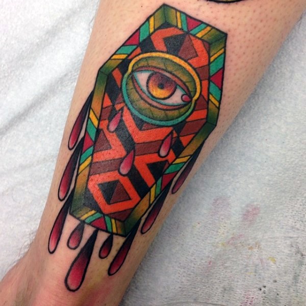 Multicolored designed coffin with eyeball and bloody drops tattoo