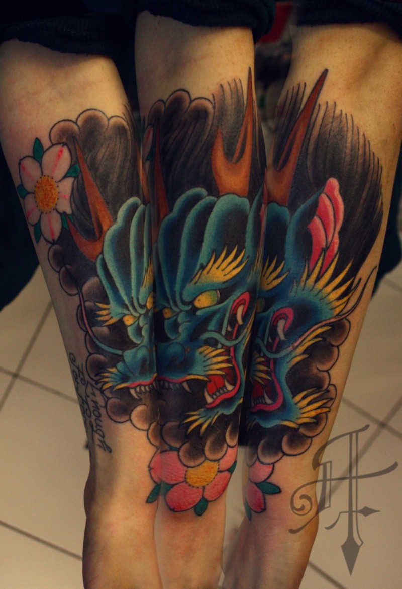 Multicolored mystical Asian oriental style Hanya tattoo with pink blossoms on leg
