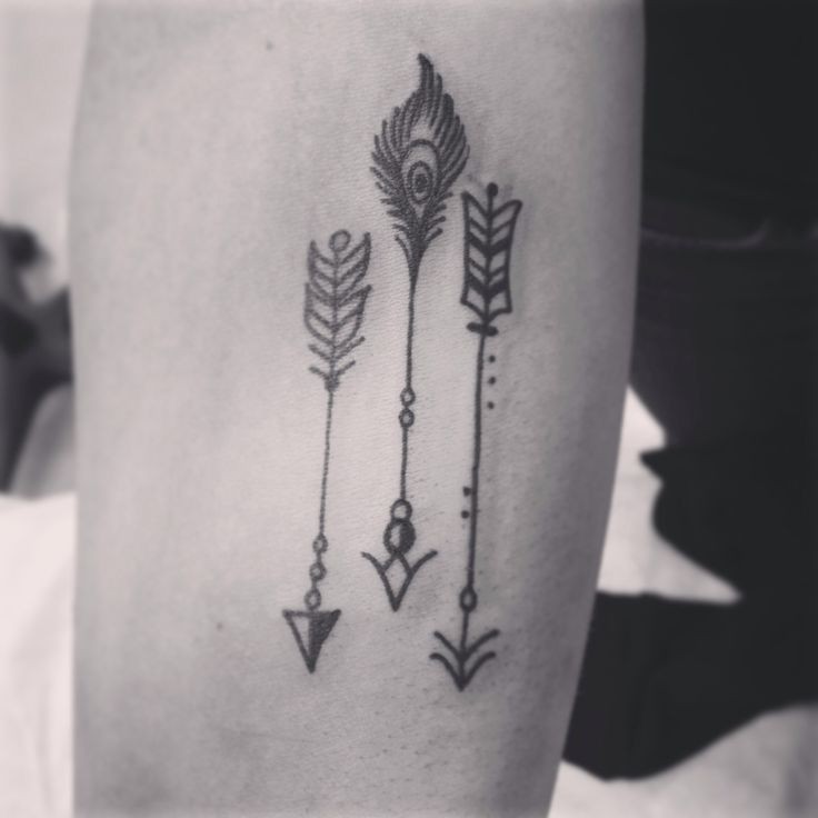 Multipurpose triple black tribal indian arrow tattoo
