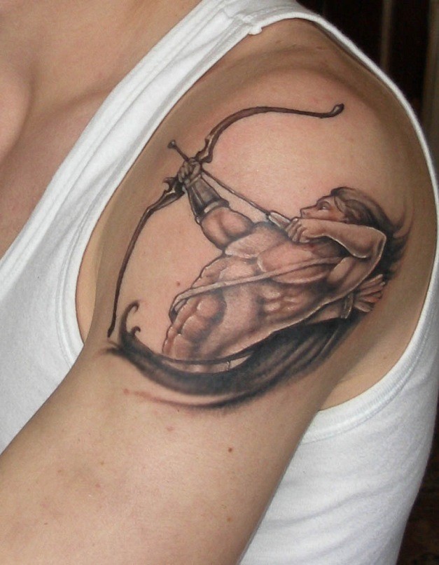 Muscular warrior with bow tattoo on shoulder