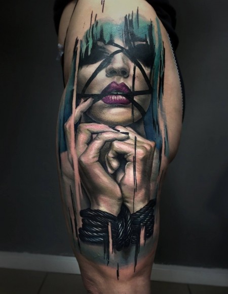 Mysterious detailed colorful tattoo of woman with tied hands