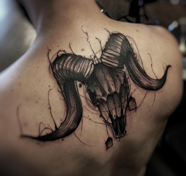 Mystic black and white sketch style big back tattoo of goat skull