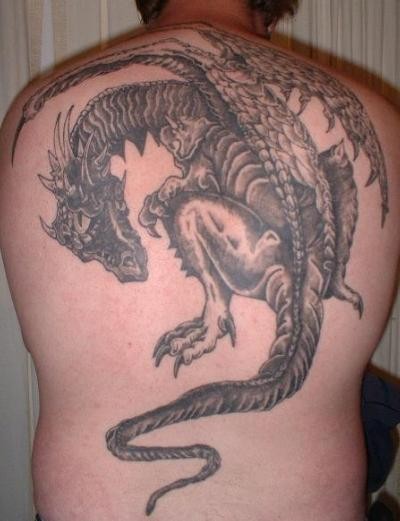 Mystic dragon tattoo on back for men