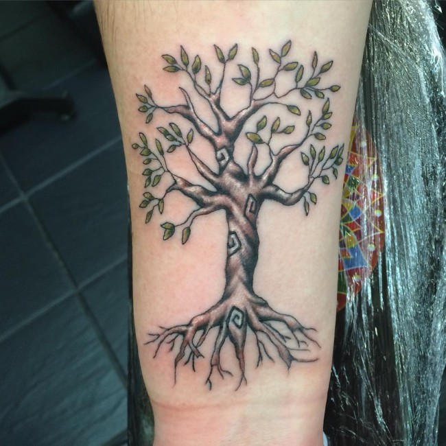 Mystical big colored lonely tree tattoo on wrist