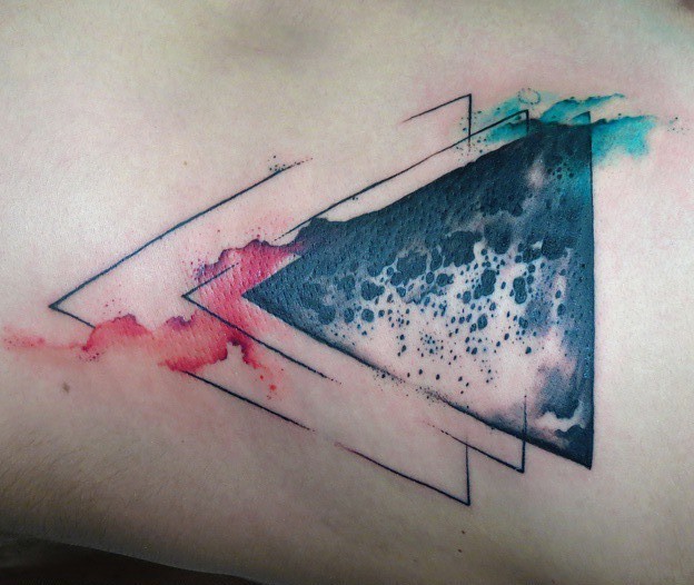 Mystical black ink triangle shaped colored tattoo stylized with moon surface
