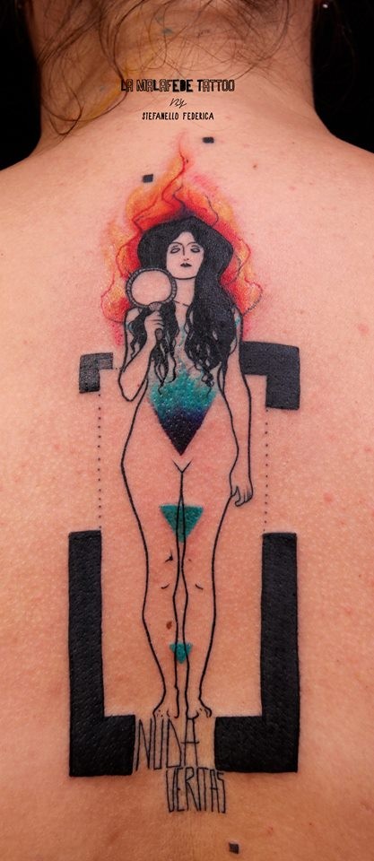 Mystical colored upper back tattoo of burning woman statue