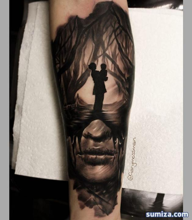 Mystical dark black ink forearm tattoo of woman portrait stylized with woman and baby