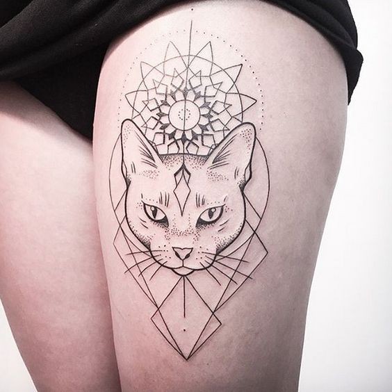 Mystical dot style black ink thigh tattoo of impressive cat with flower ornament