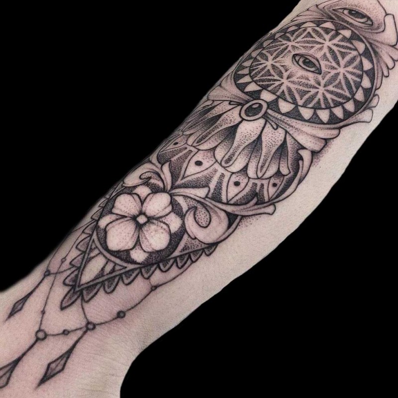 Mystical Dotwork style arm tattoo of various symbols