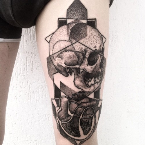 Mystical engraving style thigh tattoo of human skull with heart