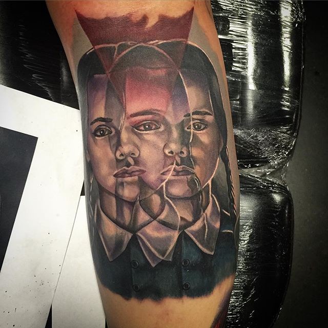Mystical ghost like colored girl portrait tattoo on arm