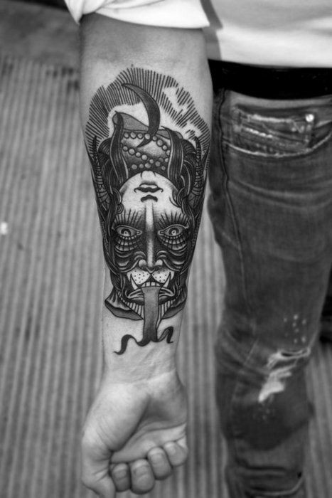 Mystical half witch half animal two sided tattoo on arm