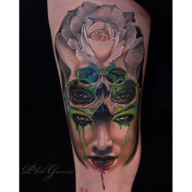 Mystical illustrative style tattoo of woman face with flower